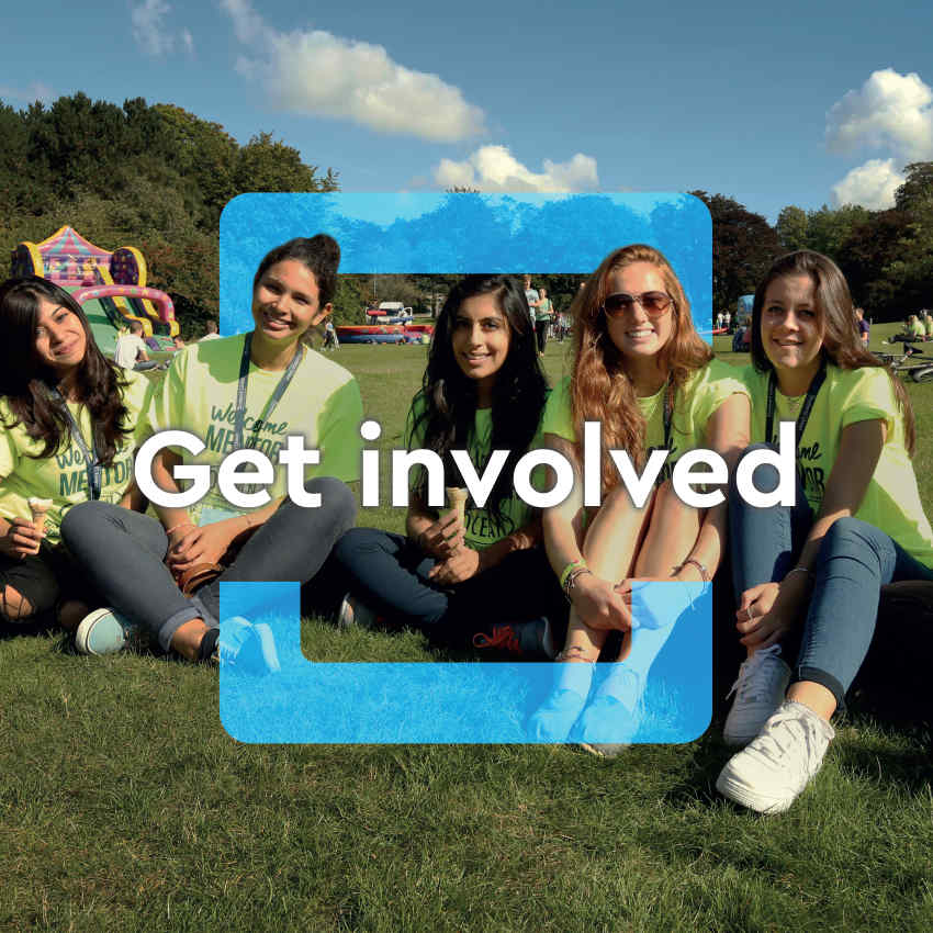Get involved - image of girls sitting on the grass